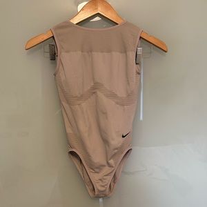 Nike Seamless Studio Women's Training Bodysuit in tan